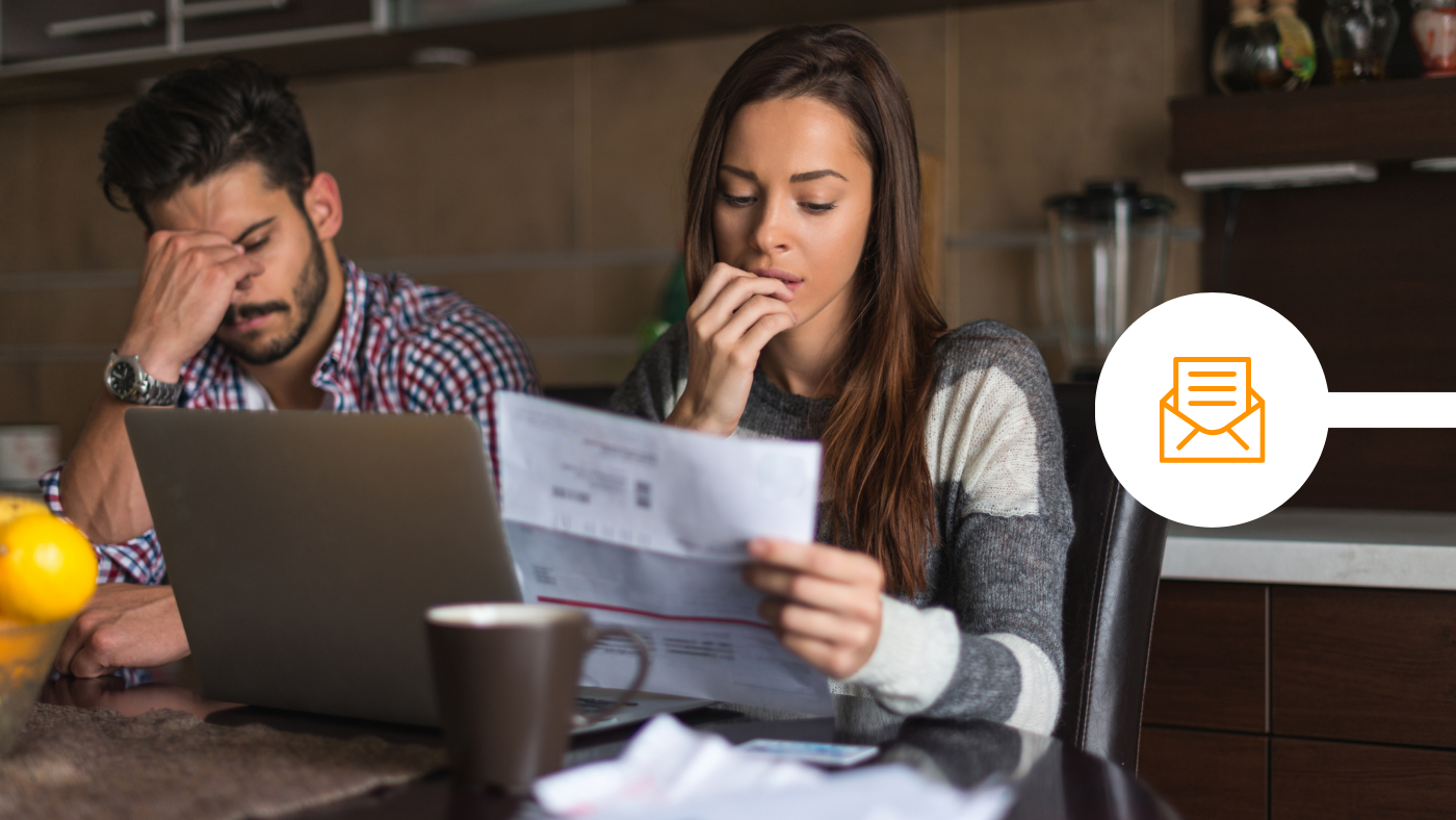 Couple opening their letters sent by post