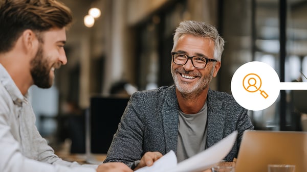 Financial adviser dealing with client in office
