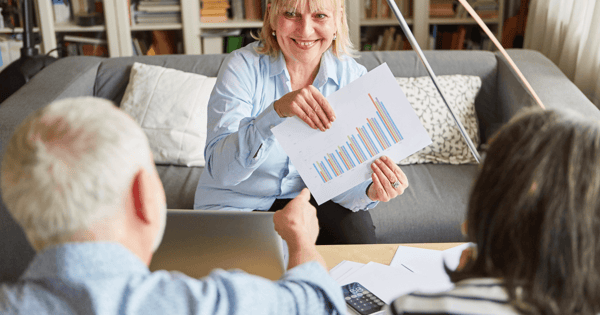 Financial adviser showing clients positive results
