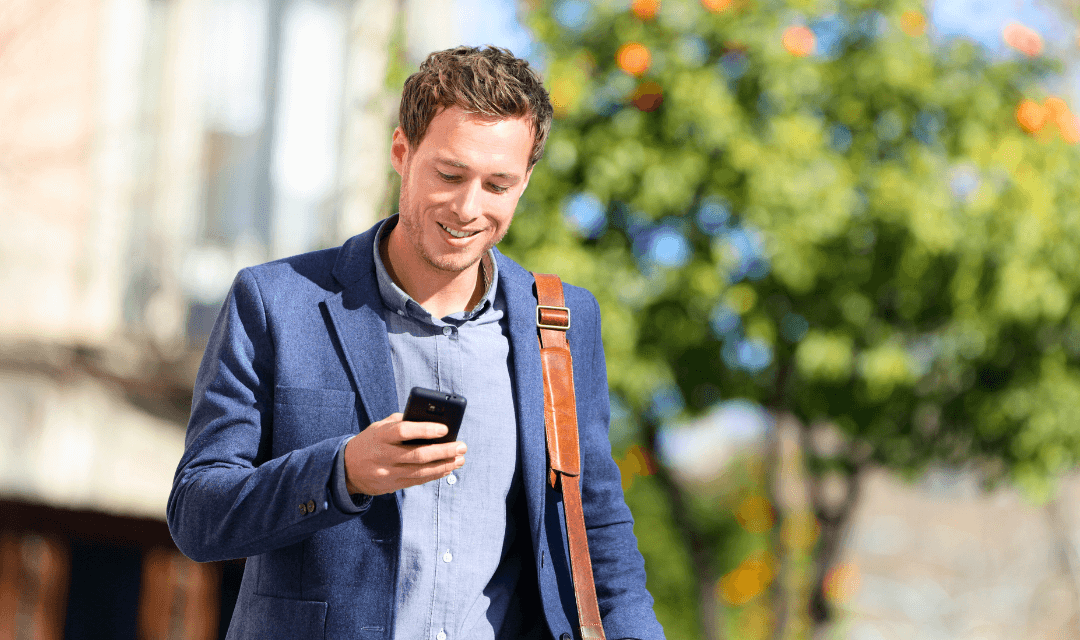 Professional receiving annual returns information on a mobile device, representing secure delivery of sensitive financial documents with Mailock
