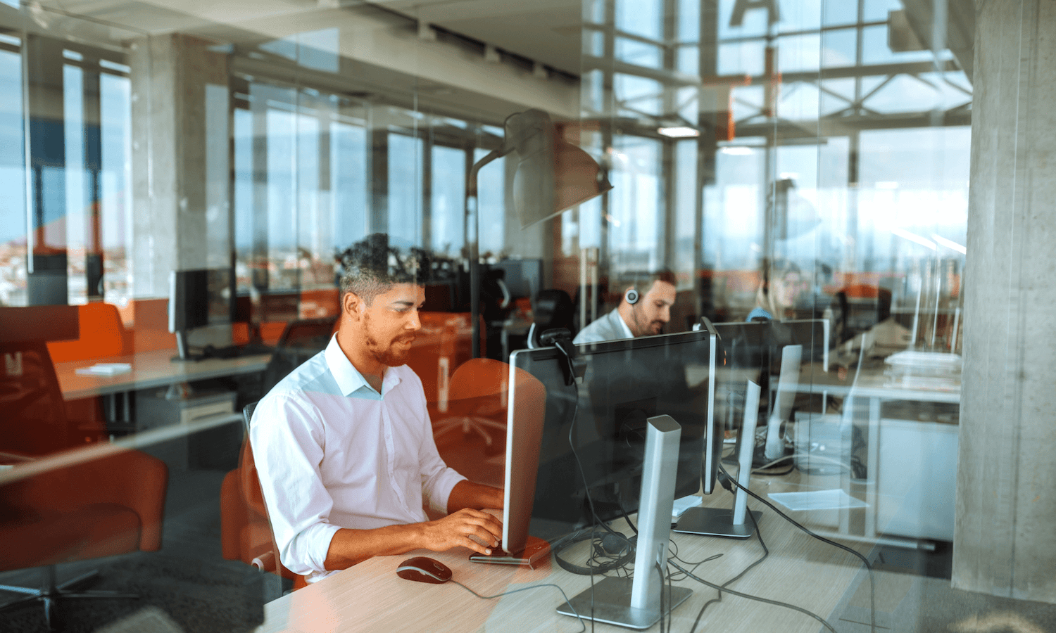 People in contact centre using computers