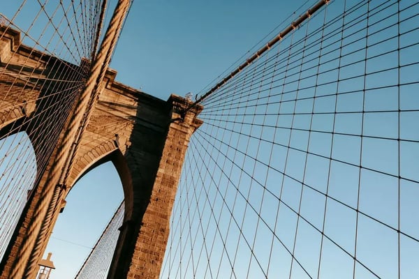 Suspension cables and stone arches of the Brooklyn Bridge