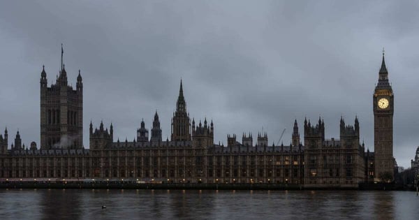 The Palace of Westminster and Big Ben seen across the River Thames at dusk