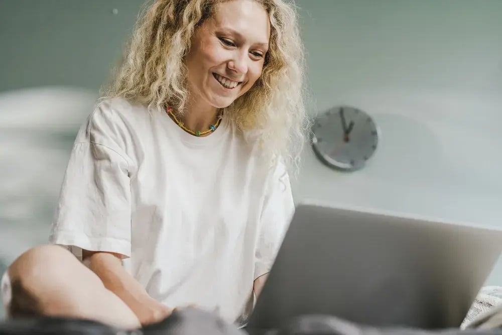 Customer using a laptop at home