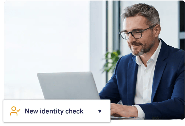Financial adviser at a laptop with the Mailock New identity check option