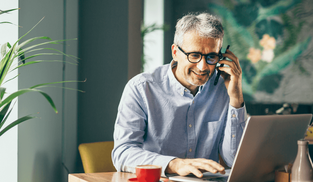 Male professional sending a Mailock secure email using his laptop